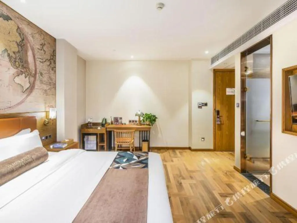 Bed in James Joyce Coffetel Luoyang Longmen High-speed Railway Station Baolong Plaza