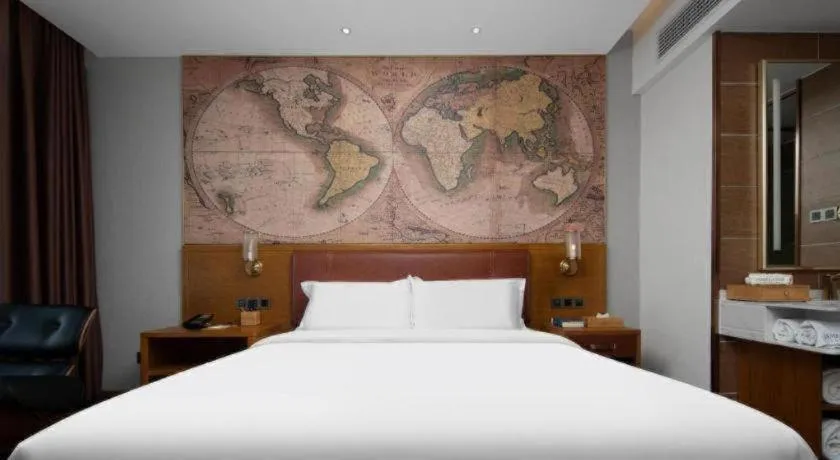 Bed in James Joyce Coffetel Luoyang Longmen High-speed Railway Station Baolong Plaza