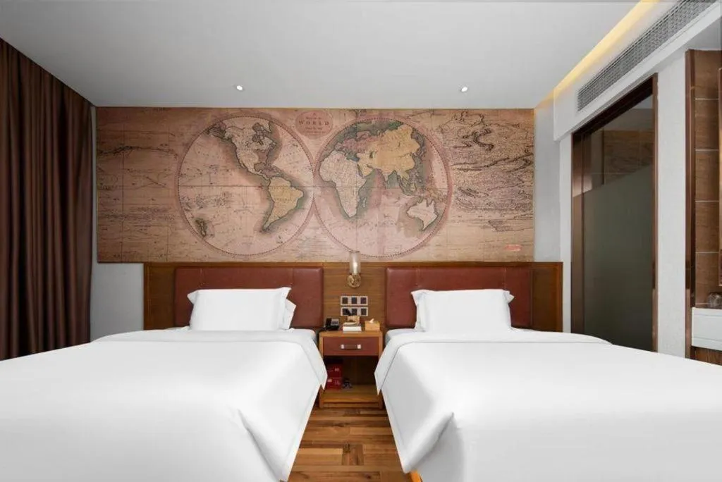 Bed in James Joyce Coffetel Luoyang Longmen High-speed Railway Station Baolong Plaza