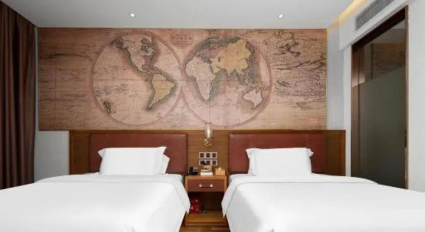 Bed in James Joyce Coffetel Luoyang Longmen High-speed Railway Station Baolong Plaza