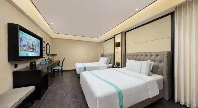 Bed in Xana Hotelle Zhongshan Bus Terminal Fuhuang Road Tianyuecheng