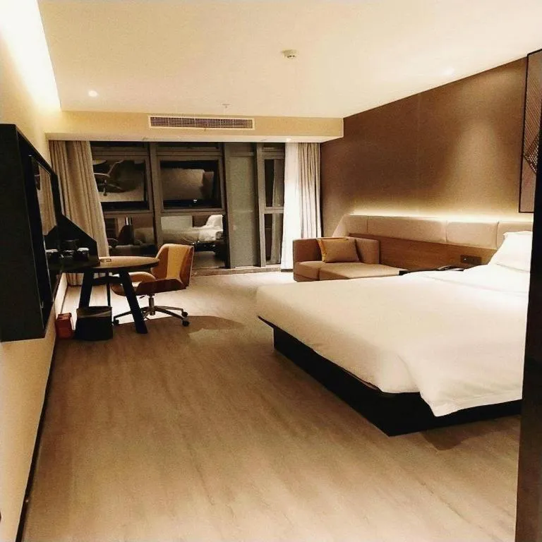 Bed in IU Hotel Chongqing Airport T3 Terminal