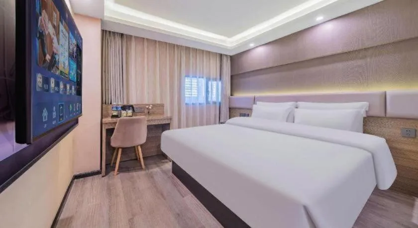 Bed in IU Hotel Chongqing Airport T3 Terminal