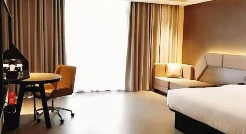 Bed in IU Hotel Chongqing Airport T3 Terminal