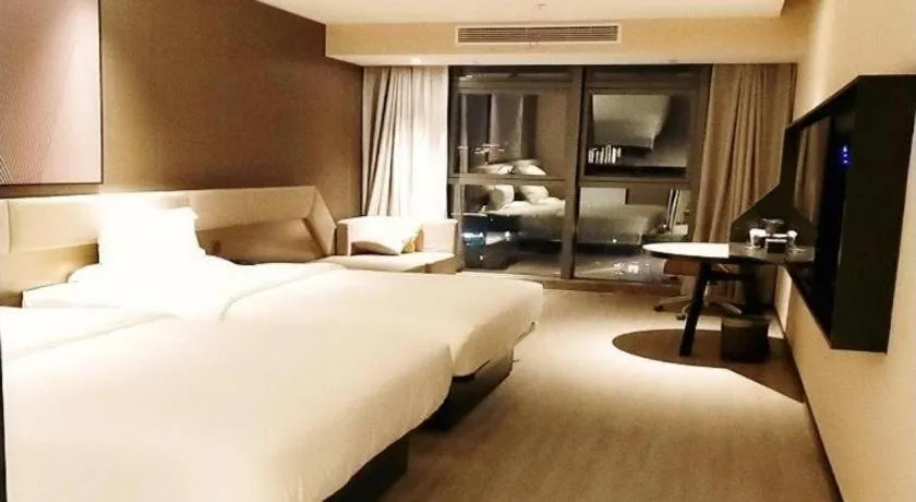 Bed in IU Hotel Chongqing Airport T3 Terminal