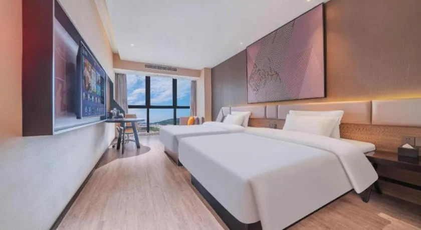 Bed in IU Hotel Chongqing Airport T3 Terminal