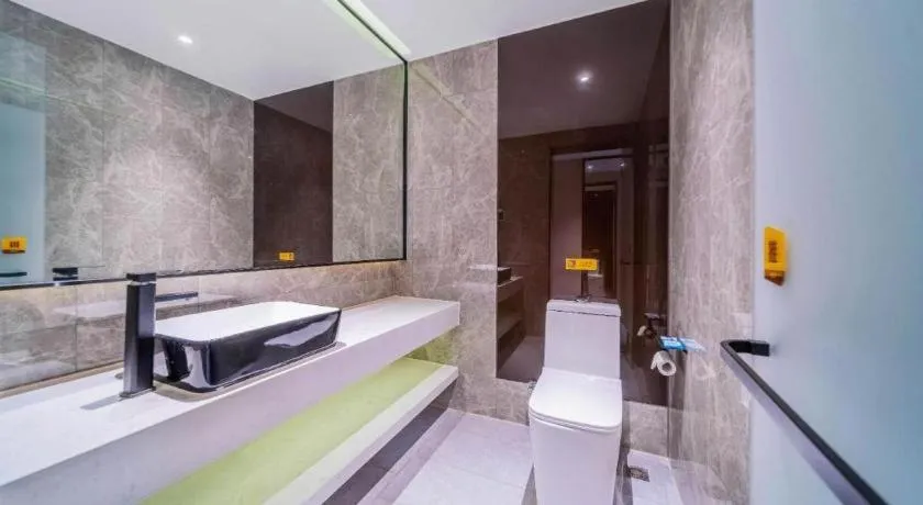 Bed in IU Hotel Chongqing Airport T3 Terminal