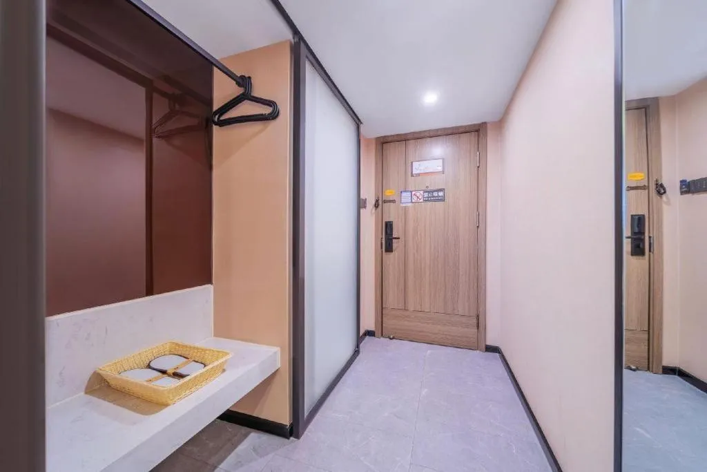 Bed in IU Hotel Chongqing Airport T3 Terminal