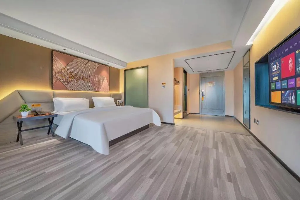 Bed in IU Hotel Chongqing Airport T3 Terminal