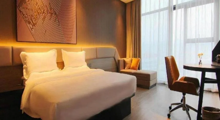 Bed in IU Hotel Chongqing Airport T3 Terminal