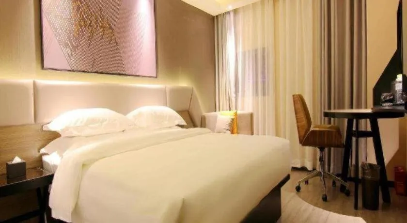 Bed in IU Hotel Chongqing Airport T3 Terminal