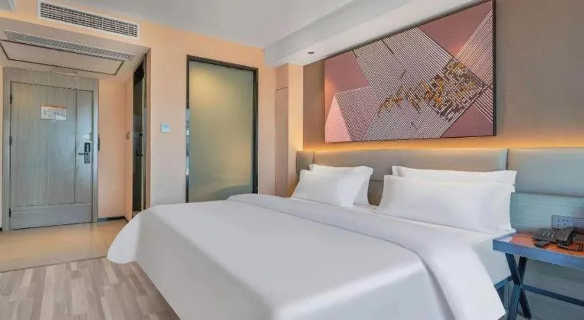 Bed in IU Hotel Chongqing Airport T3 Terminal