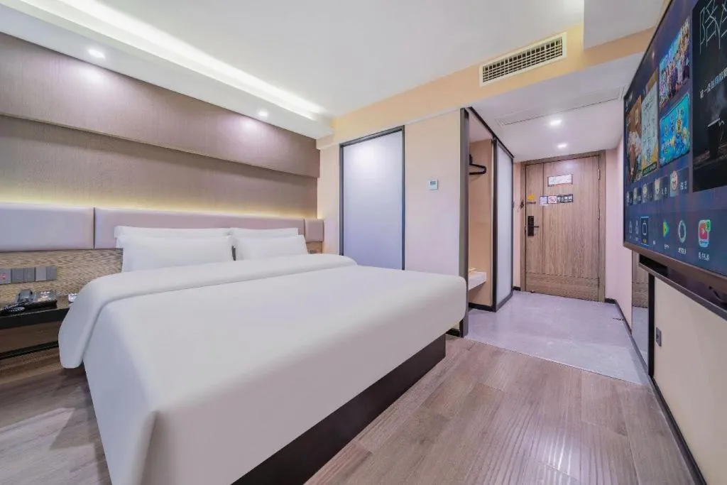 Bed in IU Hotel Chongqing Airport T3 Terminal