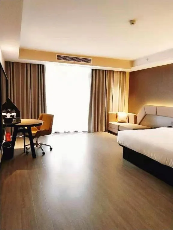 Bed in IU Hotel Chongqing Airport T3 Terminal