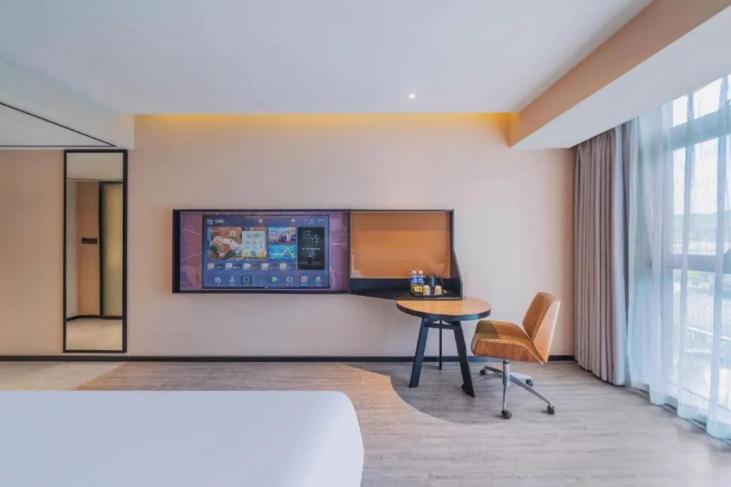 Bed in IU Hotel Chongqing Airport T3 Terminal