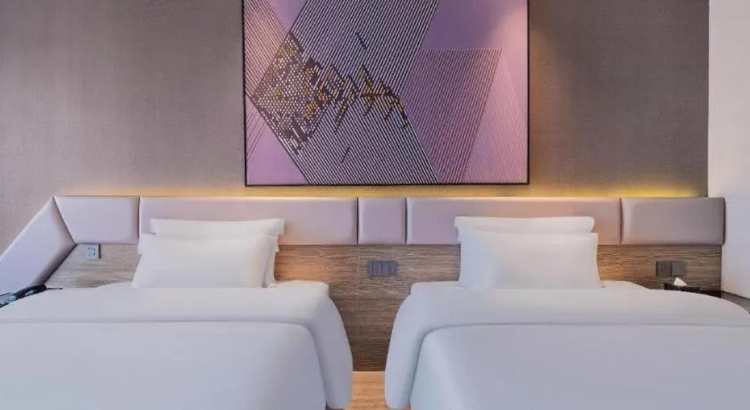 Bed in IU Hotel Chongqing Airport T3 Terminal