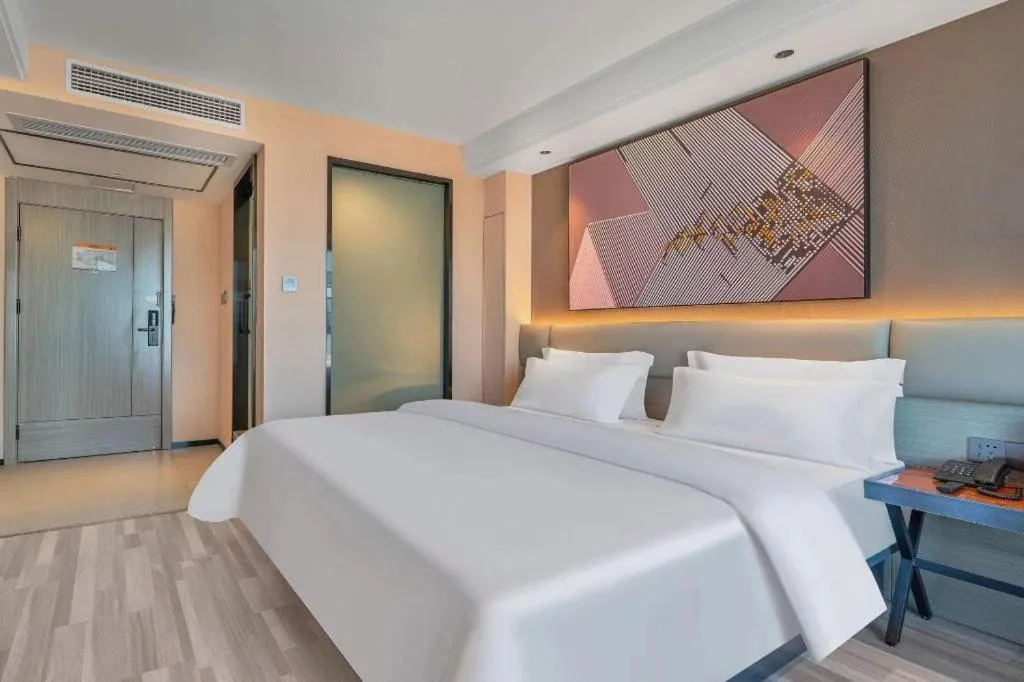 Bed in IU Hotel Chongqing Airport T3 Terminal