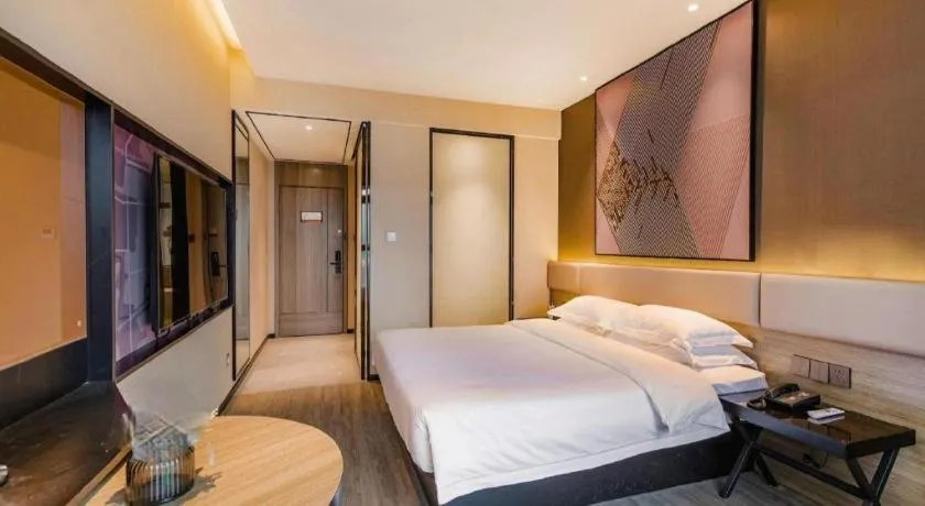 Bed in IU Hotel Chongqing Airport T3 Terminal