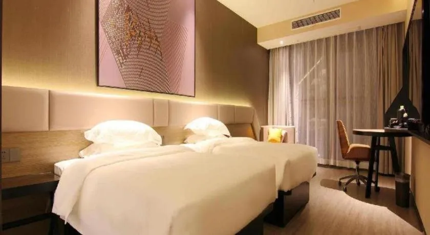 Bed in IU Hotel Chongqing Airport T3 Terminal