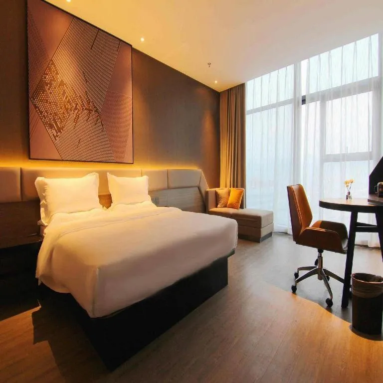 Bed in IU Hotel Chongqing Airport T3 Terminal