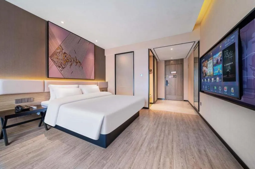 Bed in IU Hotel Chongqing Airport T3 Terminal