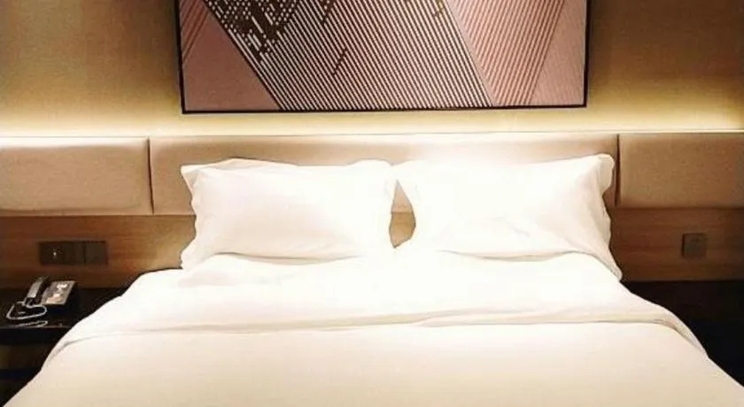 Bed in IU Hotel Chongqing Airport T3 Terminal