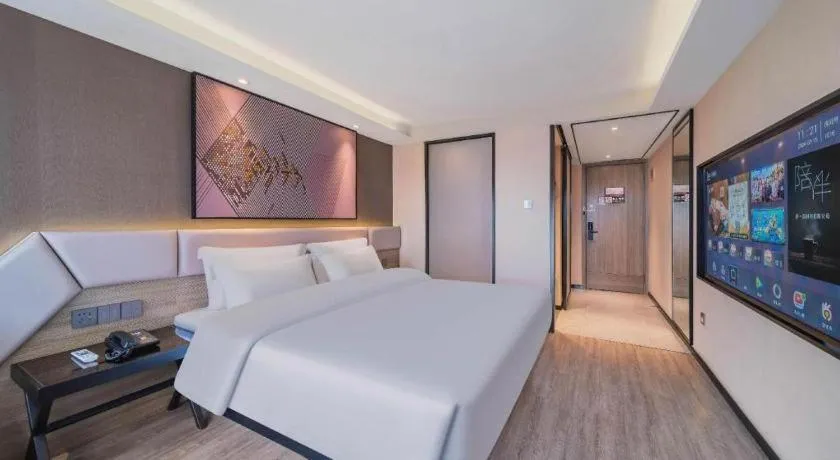 Bed in IU Hotel Chongqing Airport T3 Terminal