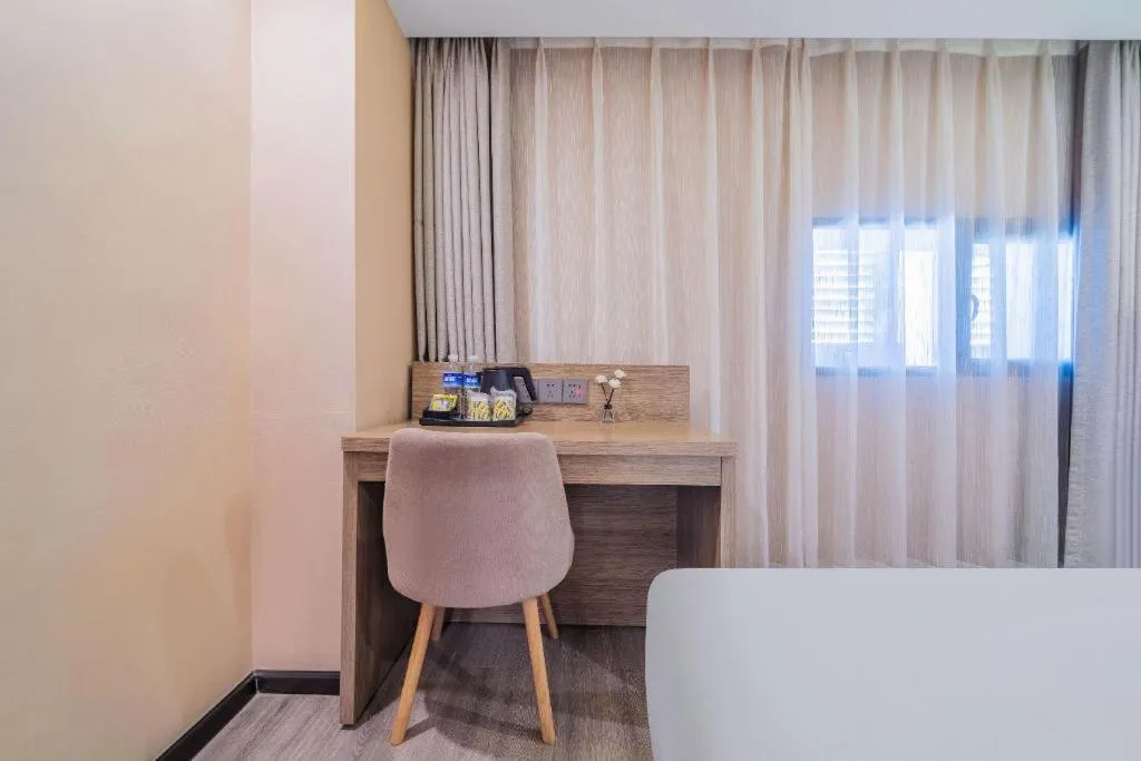 Bed in IU Hotel Chongqing Airport T3 Terminal