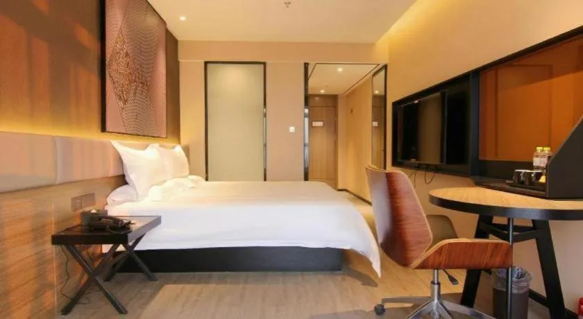 Bed in IU Hotel Chongqing Airport T3 Terminal