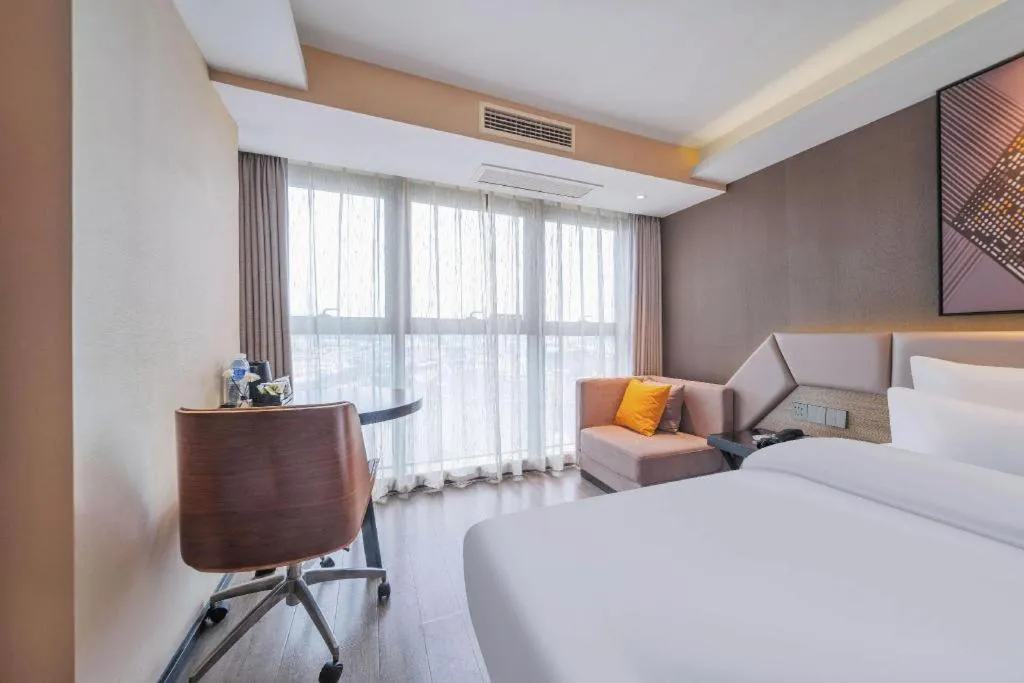 Bed in IU Hotel Chongqing Airport T3 Terminal