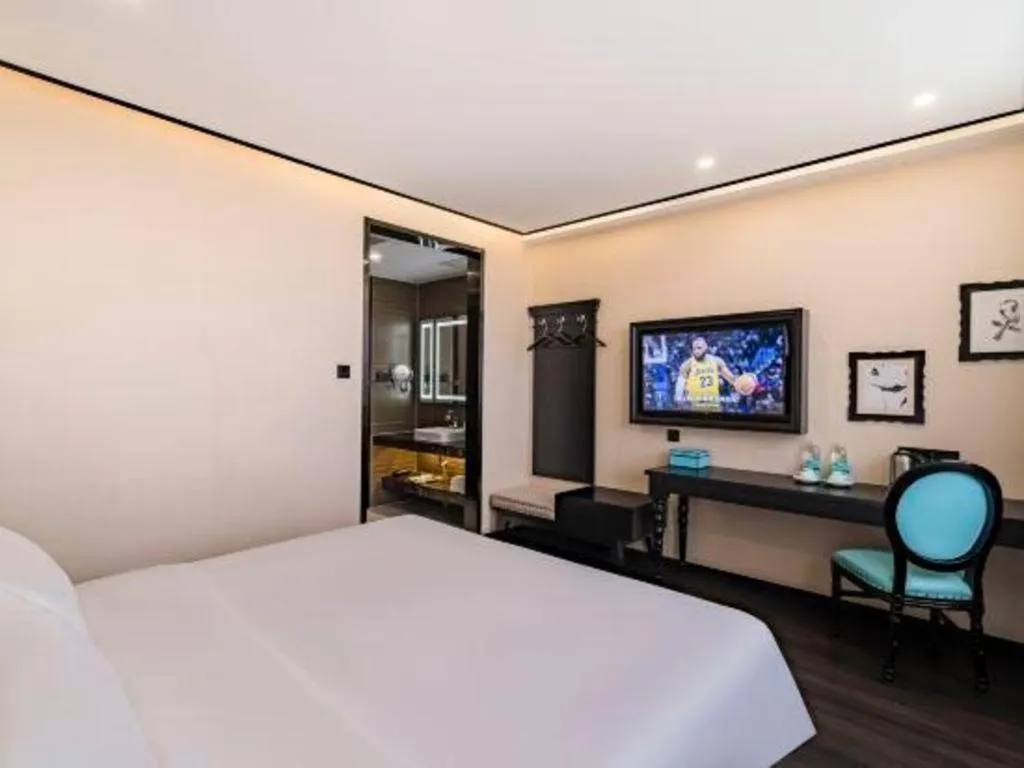 Bed in Xana Lite Hotelle Tianjin Huaming Binhai International Airport