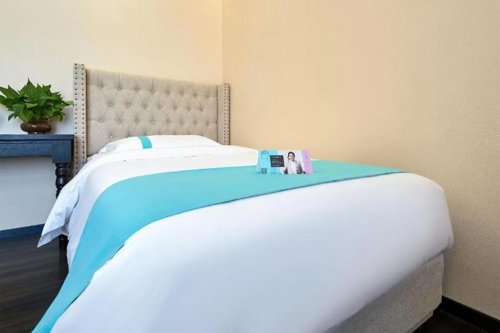 Bed in Xana Lite Hotelle Tianjin Huaming Binhai International Airport