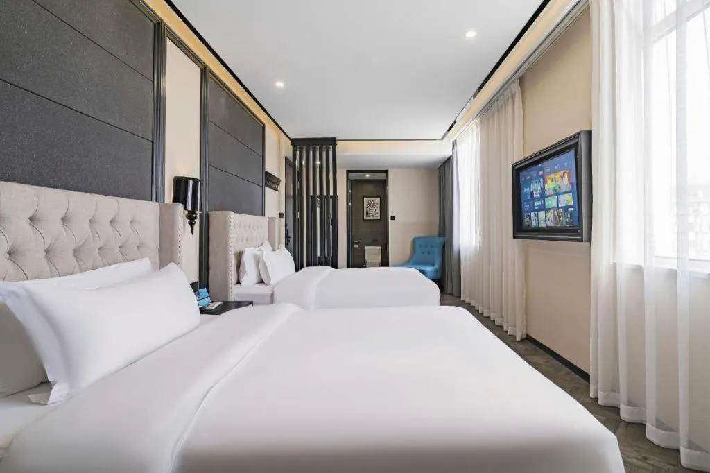 Bed in Xana Lite Hotelle Tianjin Huaming Binhai International Airport