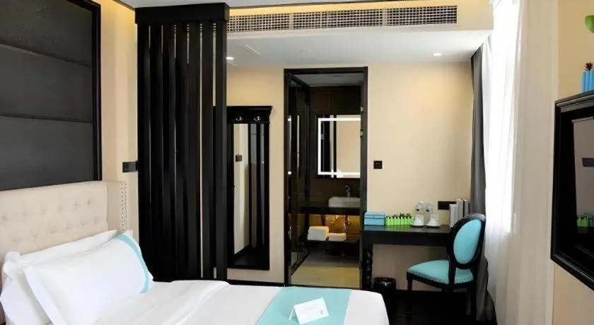 Bed in Xana Lite Hotelle Tianjin Huaming Binhai International Airport