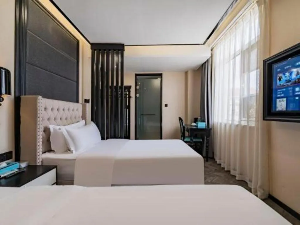Bed in Xana Lite Hotelle Tianjin Huaming Binhai International Airport
