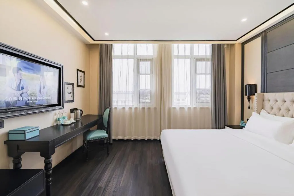 Bed in Xana Lite Hotelle Tianjin Huaming Binhai International Airport