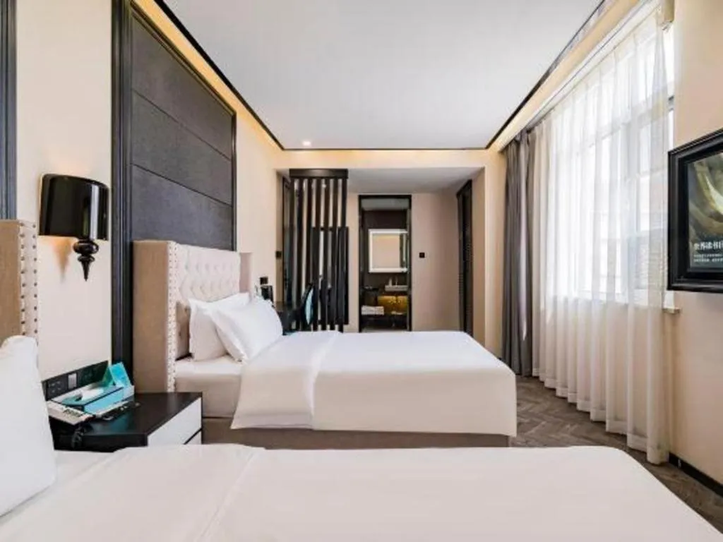 Bed in Xana Lite Hotelle Tianjin Huaming Binhai International Airport