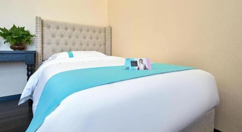 Bed in Xana Lite Hotelle Tianjin Huaming Binhai International Airport