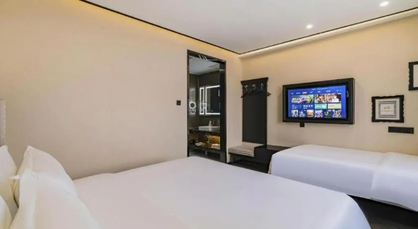Bed in Xana Lite Hotelle Tianjin Huaming Binhai International Airport