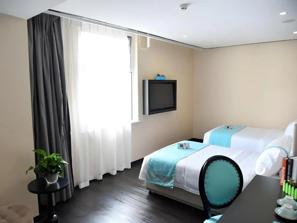 Bed in Xana Lite Hotelle Tianjin Huaming Binhai International Airport