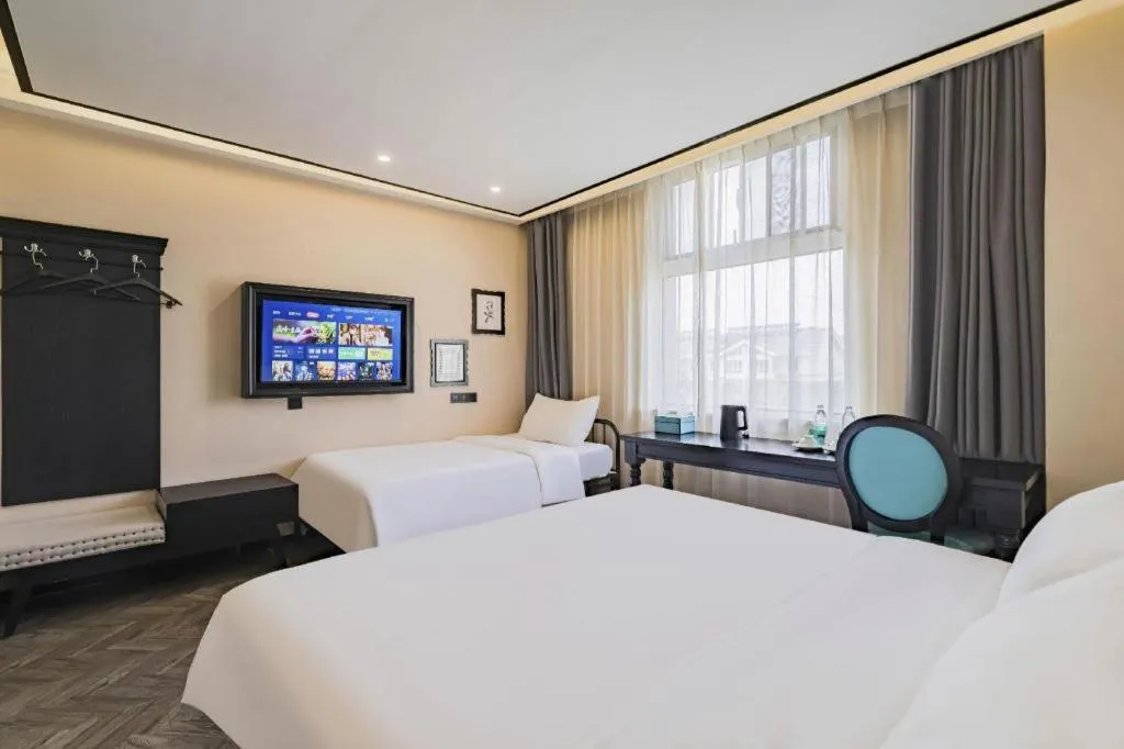 Bed in Xana Lite Hotelle Tianjin Huaming Binhai International Airport