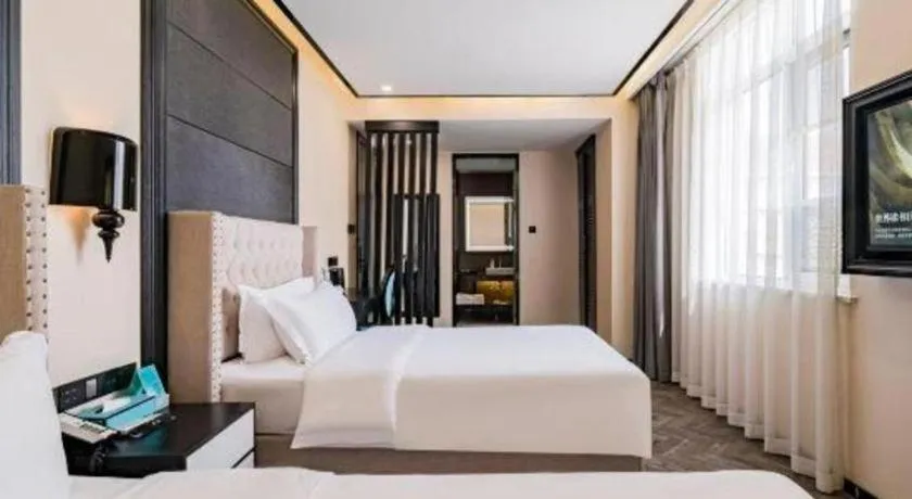 Bed in Xana Lite Hotelle Tianjin Huaming Binhai International Airport