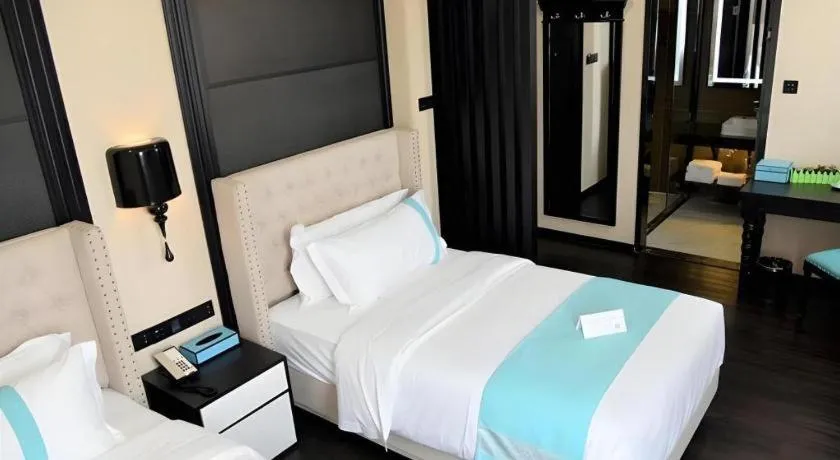 Bed in Xana Lite Hotelle Tianjin Huaming Binhai International Airport