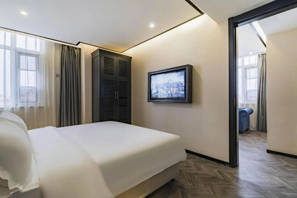 Bed in Xana Lite Hotelle Tianjin Huaming Binhai International Airport