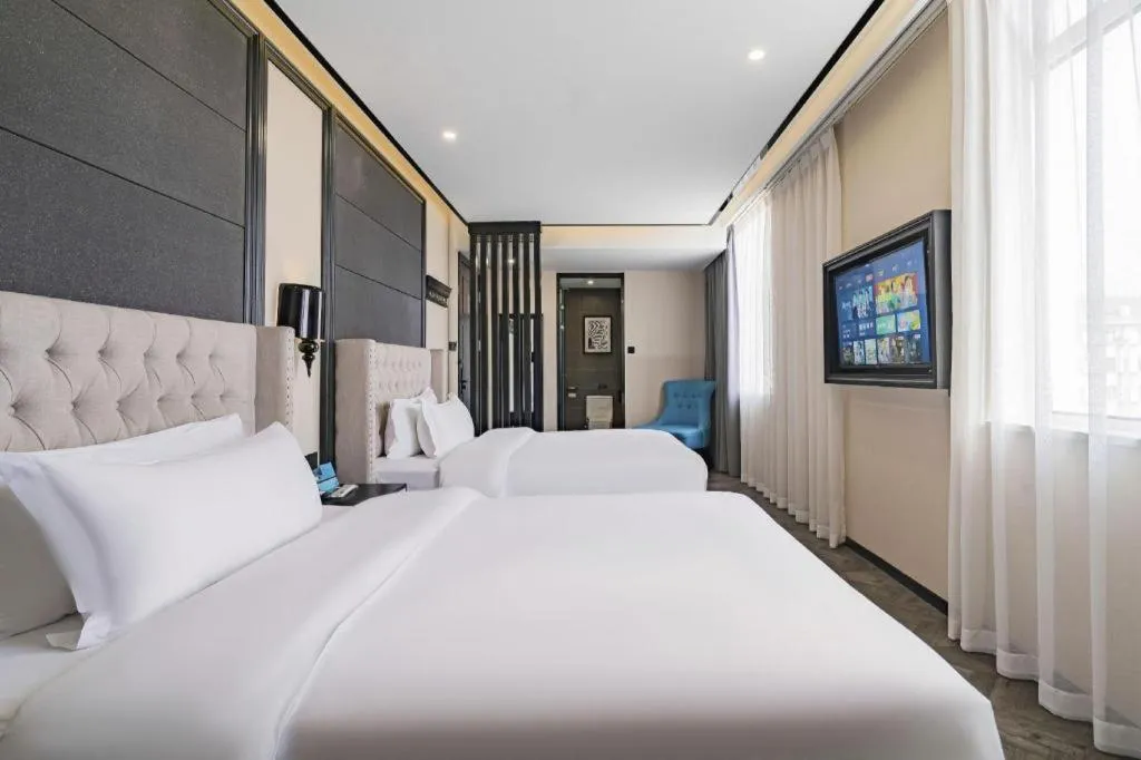 Bed in Xana Lite Hotelle Tianjin Huaming Binhai International Airport