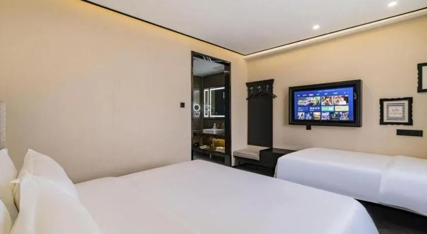 Bed in Xana Lite Hotelle Tianjin Huaming Binhai International Airport