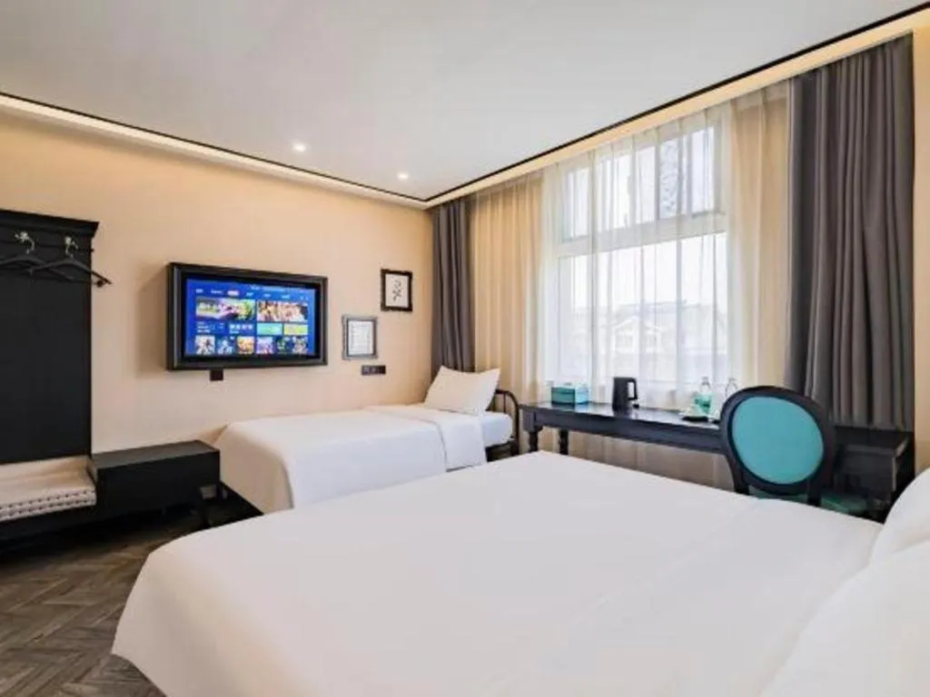 Bed in Xana Lite Hotelle Tianjin Huaming Binhai International Airport