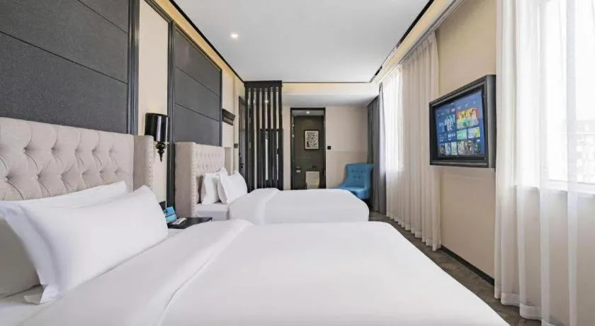 Bed in Xana Lite Hotelle Tianjin Huaming Binhai International Airport