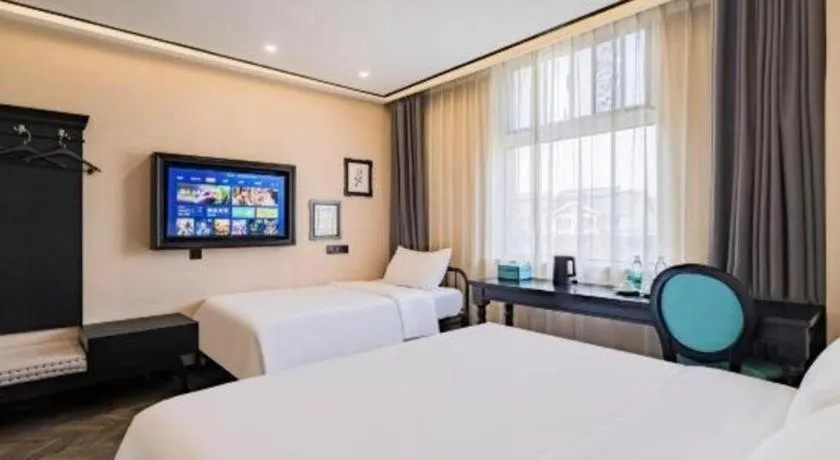 Bed in Xana Lite Hotelle Tianjin Huaming Binhai International Airport