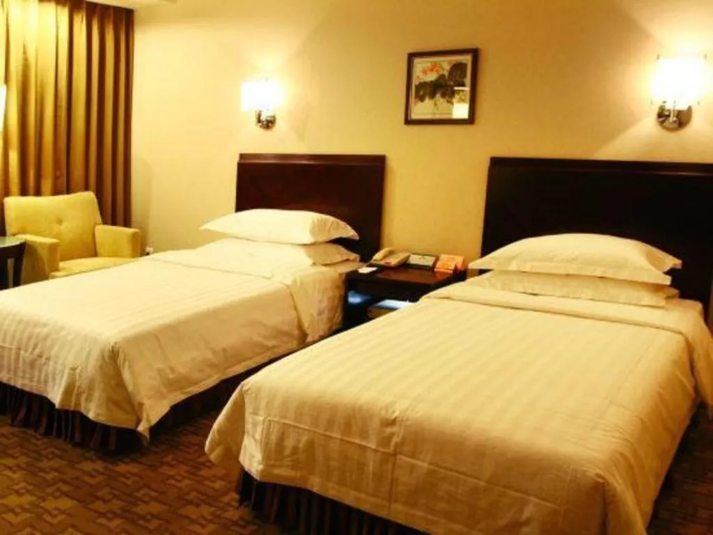 Bed in Jinjiang Hotel Qianan